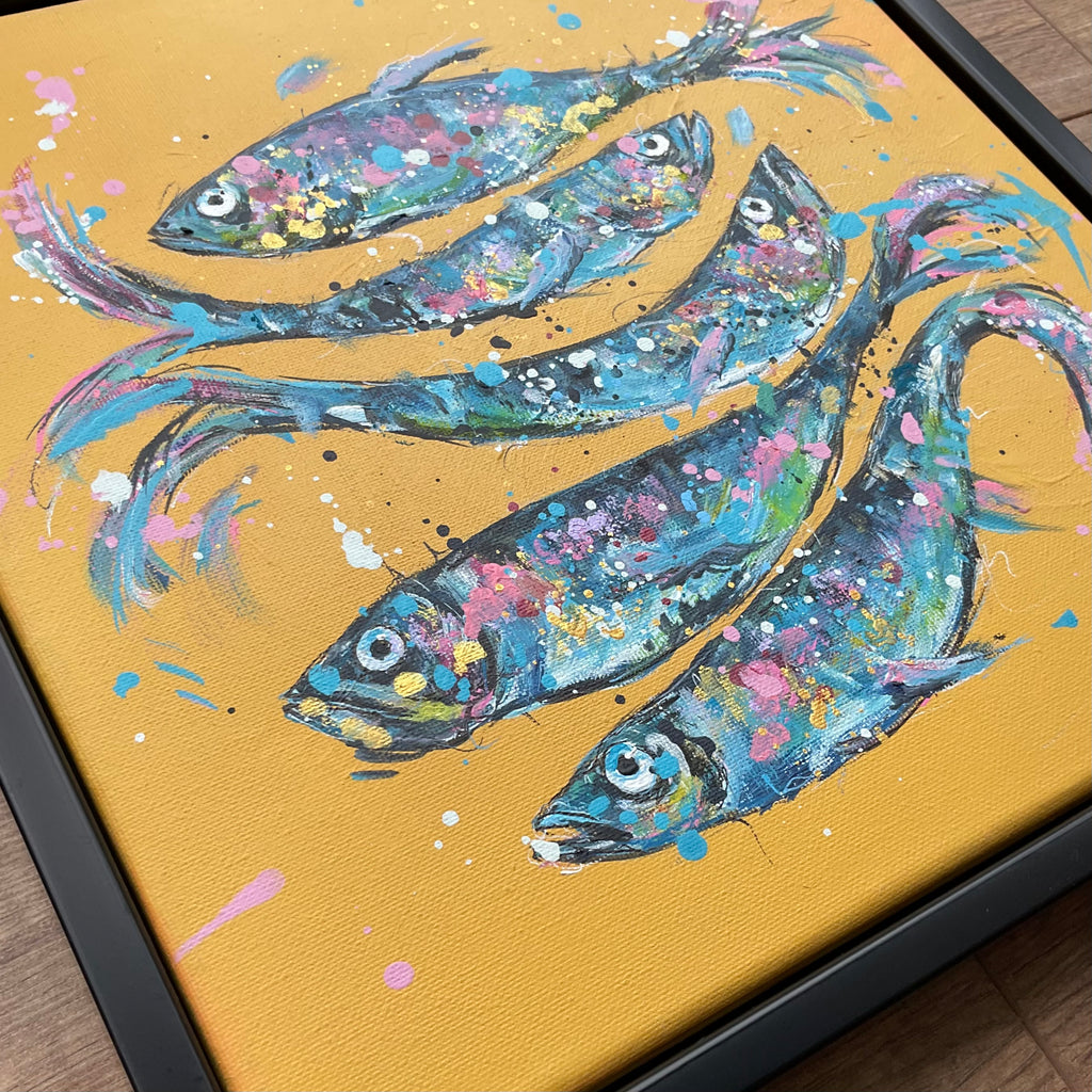 Fish on yellow framed in a black floating frame 30cm